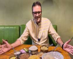 Sanjeev Seth eating non vegetarian food